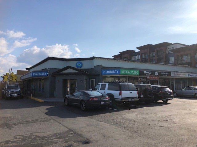 Retail strip roofed by TL Roofing